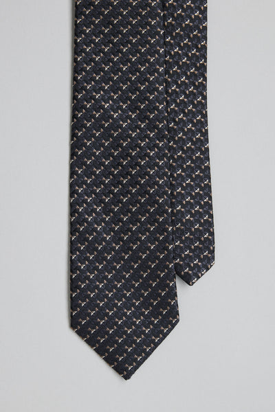 A close-up of the Barkers Malvern Pattern Tie, a dark silk tie featuring a repeating pattern of light dachshund silhouettes, laid flat on a light gray background—ideal for adding character to your business look.