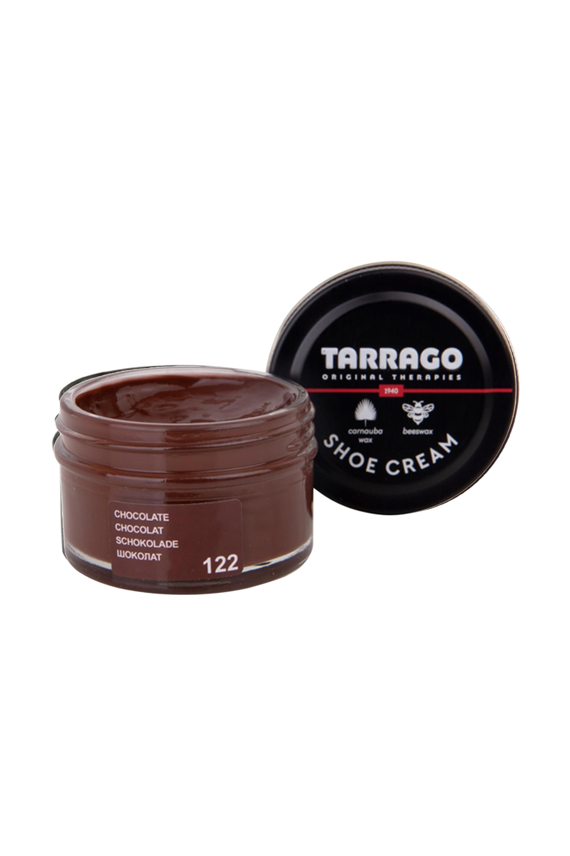 A glass jar of Tarrago Shoe Cream by Tarrago in Chocolate 122 color, lid off to reveal the creamy brown polish inside. Enriched with carnauba wax for deep leather nourishment and a rich chocolate shade.