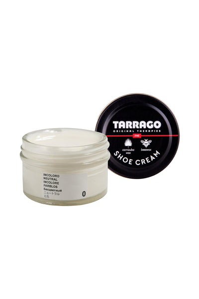 A jar of Tarrago Shoe Cream with a black lid is shown beside it. The off-white, neutral cream—ideal for leather care—features the brand name on the lid and blends carnauba wax for premium shoe shine and conditioning.