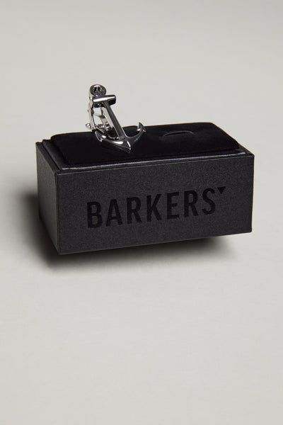 The Barkers Anchor Tie Clip in a silver tone is showcased on a black velvet box with BARKERS in bold—an ideal fisherman gift for any occasion.