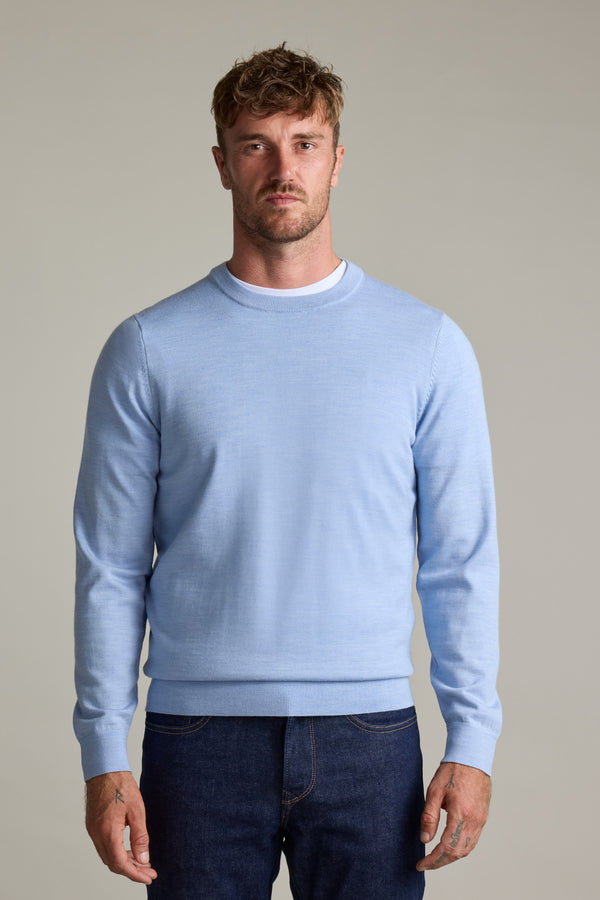 Man wearing Barkers Skyland ZQrx Merino Crew sweater and dark jeans, against a plain background.