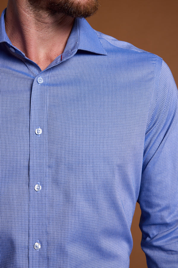 Man wearing Barkers Saxon Texture Business Shirt; neck, chin, torso shown on brown background.
