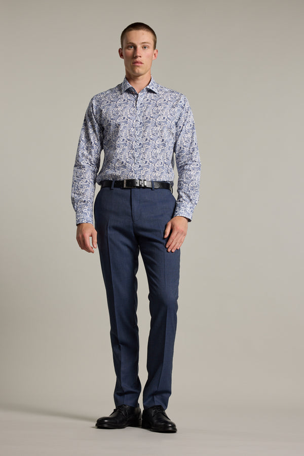 A man wearing the Buckman Print Business Shirt by Barkers in a tailored fit floral design.
