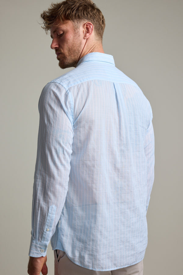 A man with short, light brown hair wears the Barkers Russell Stripe Shirt, a lightweight 100% cotton long sleeve featuring vertical white stripes, shown from the back against a plain background.