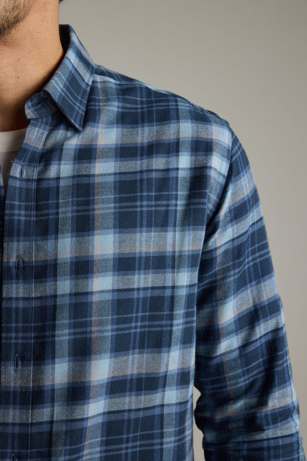 Man wears Barkers Lexington Check Shirt, tailored fit, shown shoulders to chest.