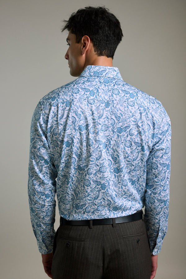 Man in Barkers Ronton Print Business Shirt and dark pants, facing away, plain background.