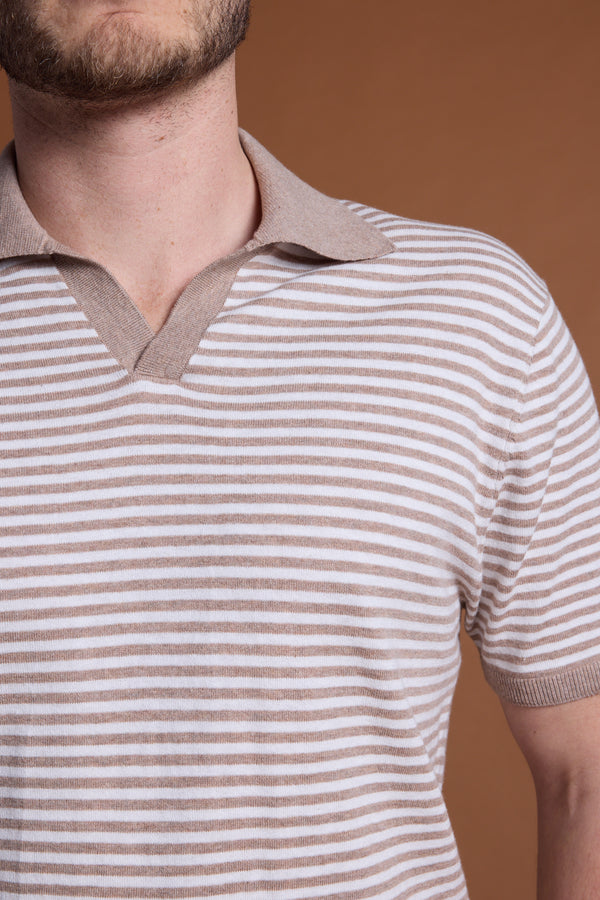 A man wearing the Barkers Parkway Cotton Stripe Polo in beige and white rib knit stands against a brown background, showing only his lower face, neck, and upper torso.