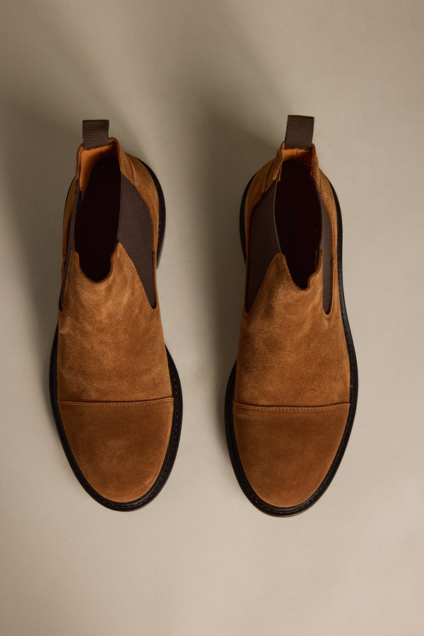 Top view of Barkers James Chelsea Boot in brown suede on a neutral background.