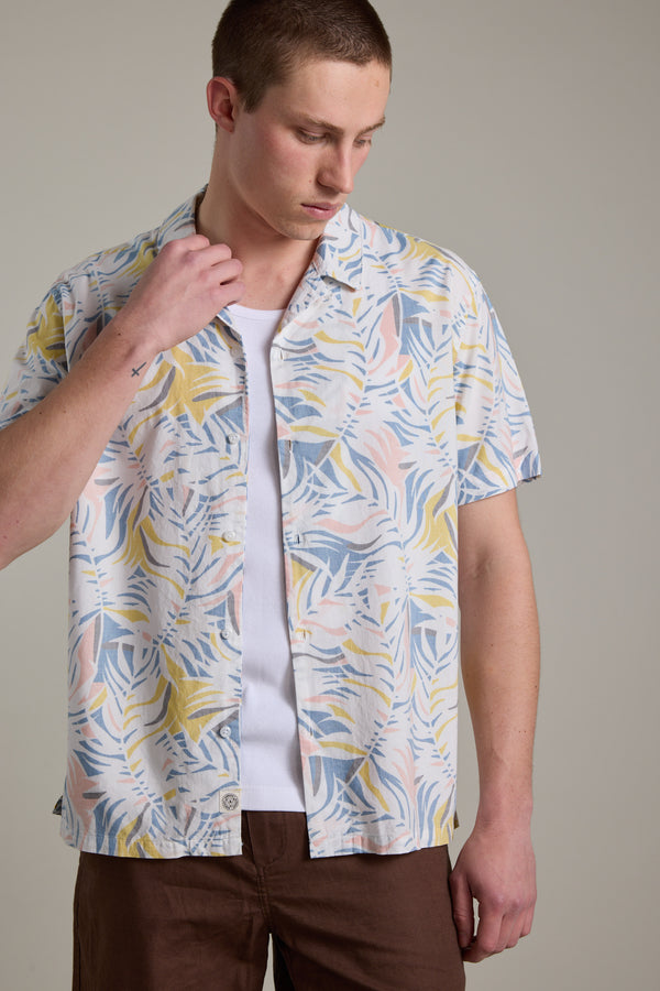 A man wearing the Barkers Jordan Print Cuban Shirt.