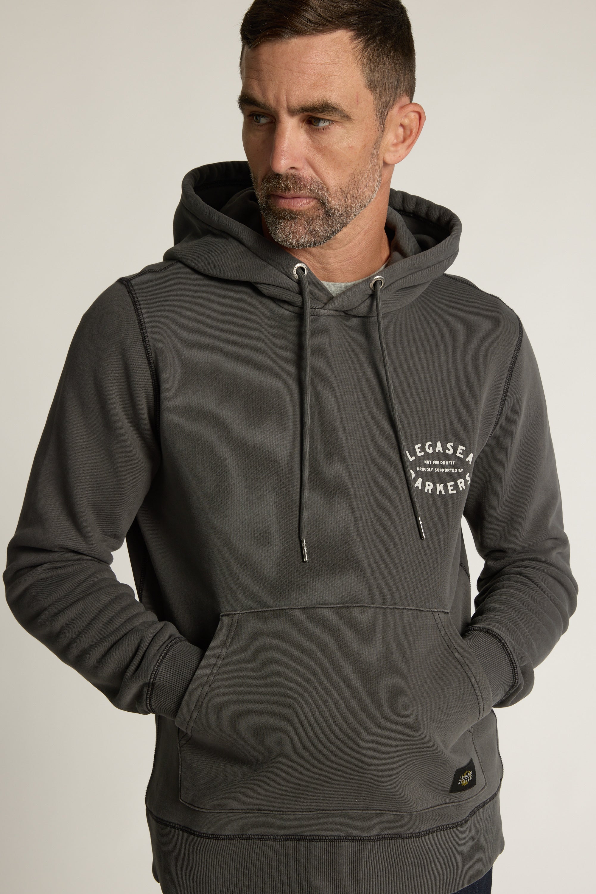 Legasea Supporter Hoodie in washed black, relaxed fit