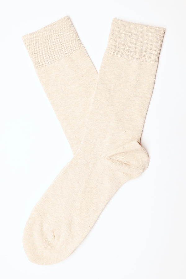 A pair of Barkers Business Sock in light beige, crew-length cotton blend, laid flat on a white background with one sock slightly overlapping the other.