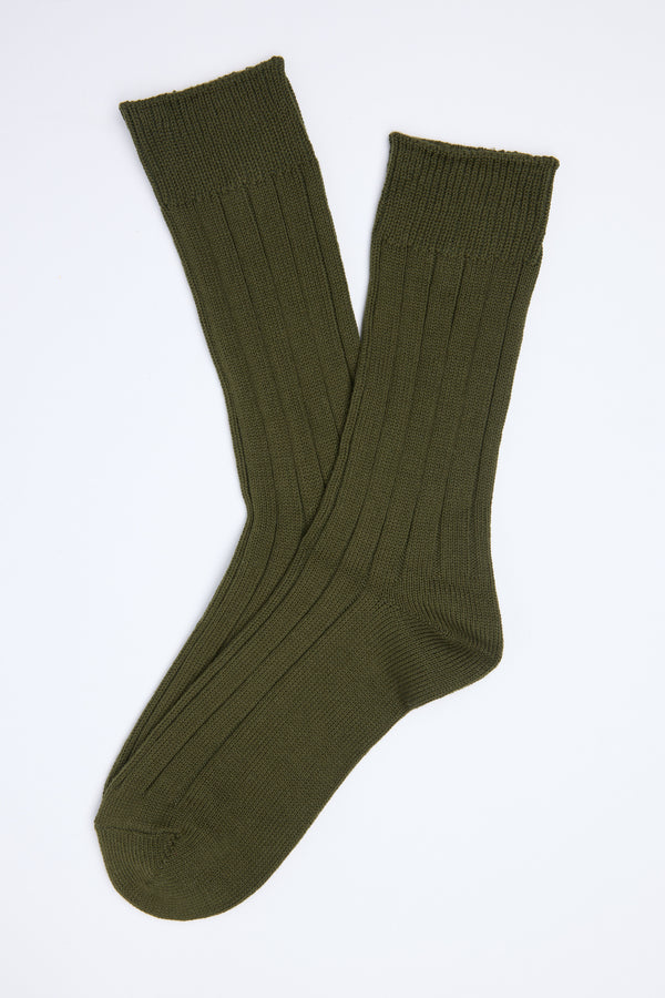 The Barkers Hutt Boot Sock, in olive green cotton blend, is shown laid flat on a white background with one sock slightly overlapping the other—an everyday essential for comfort and style.
