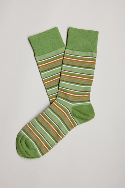 A pair of Barkers Ashley Stripe Socks in green with white, orange, and brown stripes—crafted from soft cotton for everyday comfort.