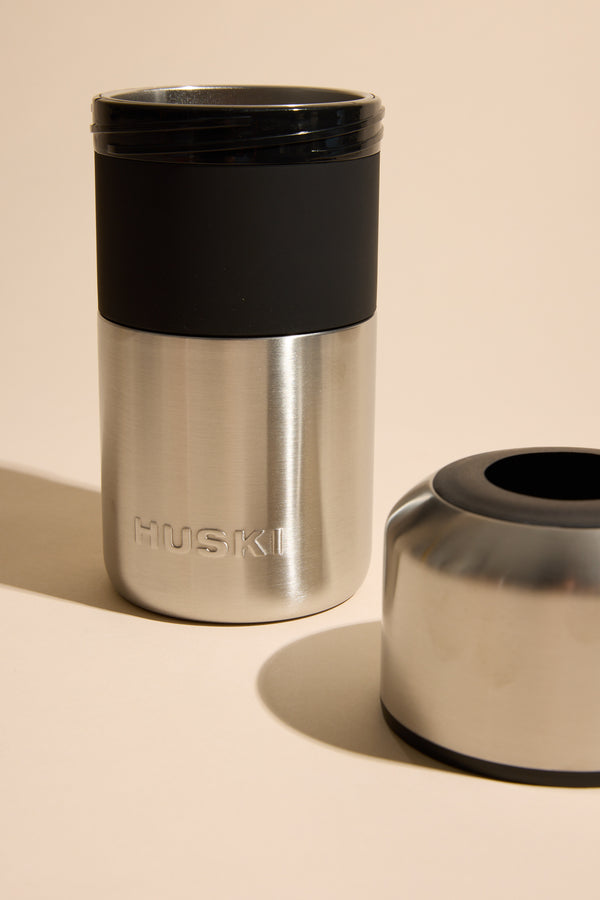 Huski Wine Cooler by Huski shown with black lid and detachable base on a neutral background.