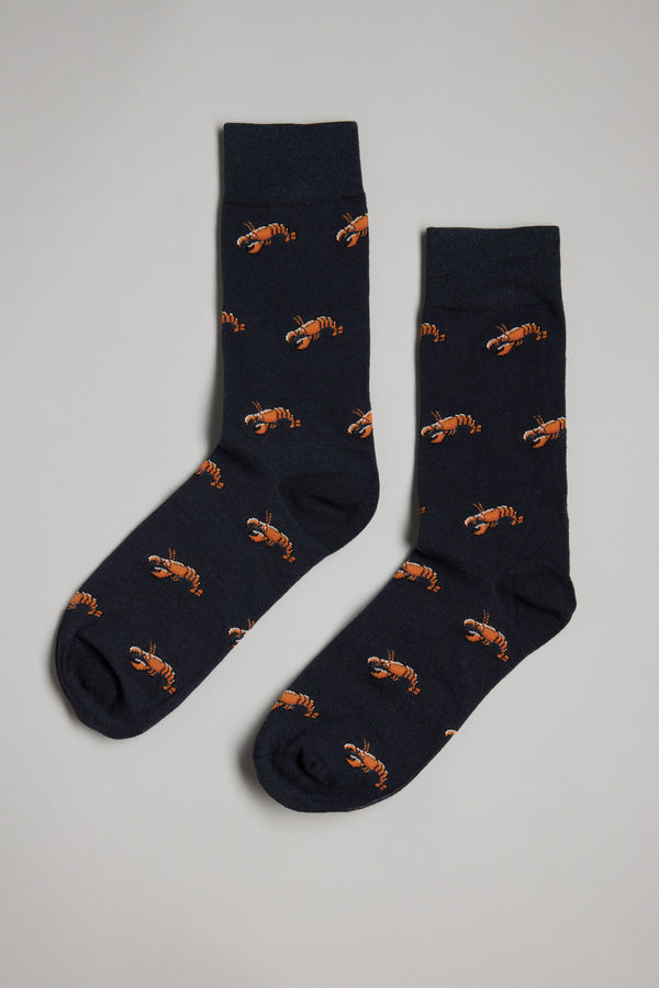 The Barkers Crayfish Sock features a dark navy cotton design with an all-over pattern of small orange crayfish—perfect as a gift for men.