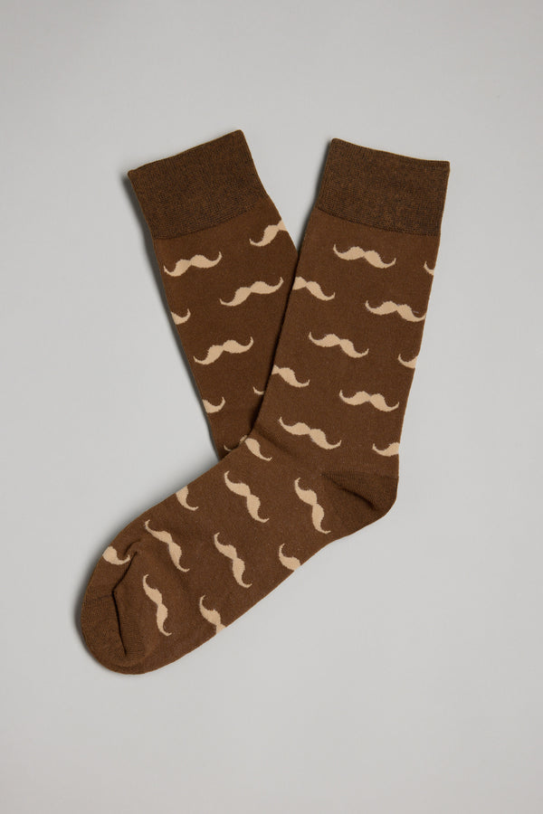 A pair of Barkers Moustache Socks in brown, featuring a repeating beige mustache pattern, laid flat on a light gray background—ideal for Christmas gifts or Secret Santa.