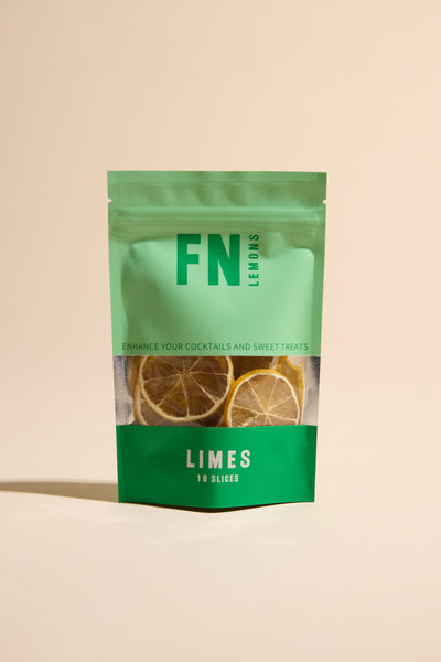 A green and teal F N Lemons - Limes 10 Slice Pouch features dried lime slices visible through a clear window—perfect as a premium garnish for cocktails or baking. Pack enhances your drinks and desserts with F N Lemons quality.
