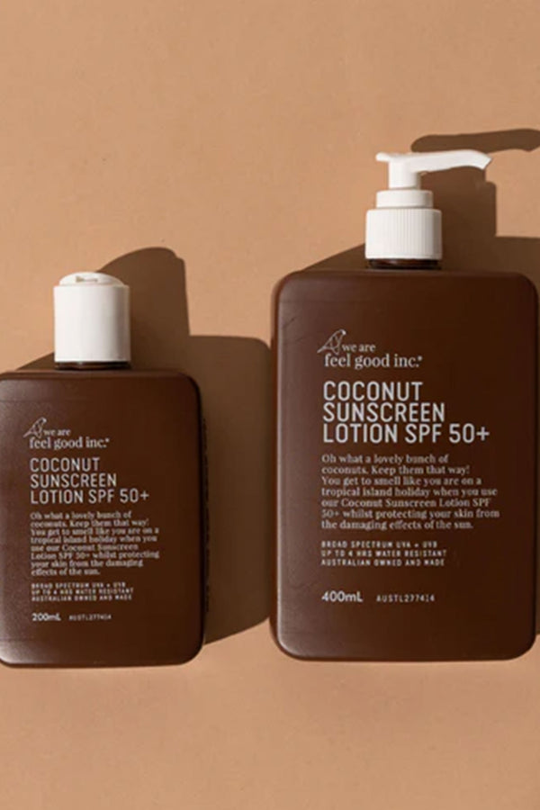 A brown bottle of Other Coconut Sunscreen Lotion SPF50+ 75ml (Traveller)—broad spectrum and water resistant—sits on a beige background, featuring a white cap.