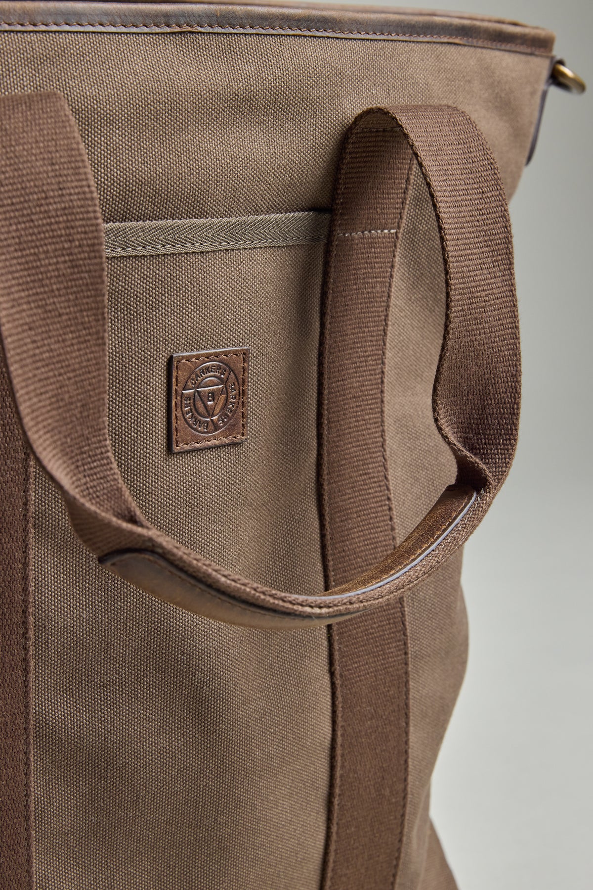 Barkers Foxton Canvas Convertible Tote—brown, sturdy handles, fits laptop, stitched logo.
