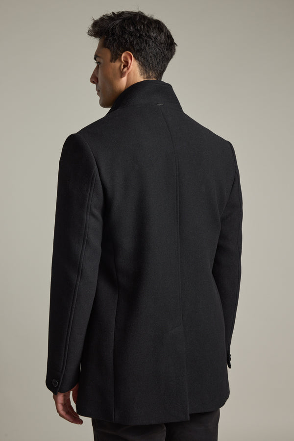 Man in Barkers Raymond Coat, back view, against plain light gray background.