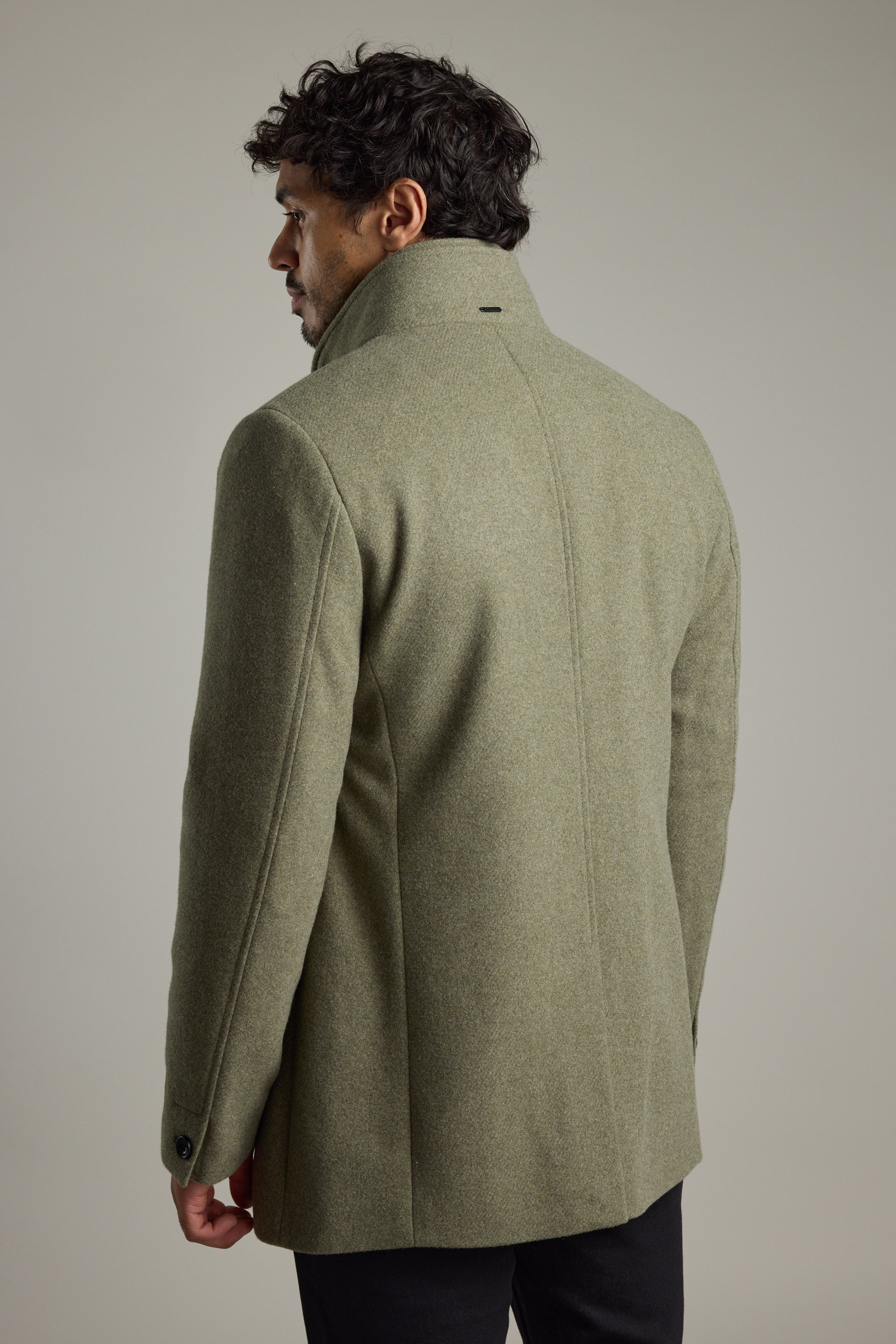 Man wearing Barkers Raymond Coat in light gray wool blend, seen from the back.
