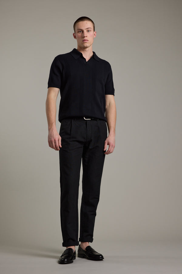 A man in a black shirt and Barkers Newman Linen Pant.