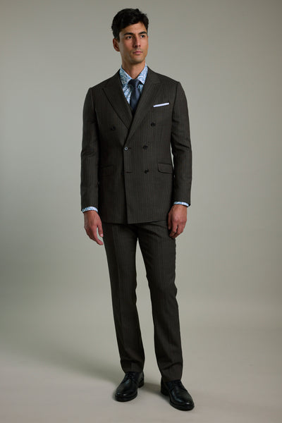 Man in a Barkers Radcliffe Stripe Double Breasted Suit Jacket, standing against a plain background.