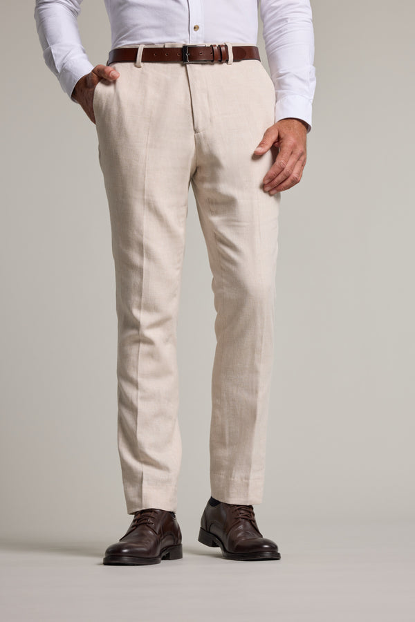 Man wearing Barkers Thompson Textured Linen Pant, white shirt, brown belt, dress shoes.