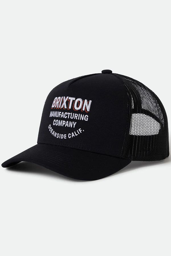 The Brixton C NP MP Trucker Hat is a black mesh hat with “Brixton Manufacturing Company Oceanside Calif.” embroidered in white and red, crafted from recycled fishing nets for eco-conscious style.