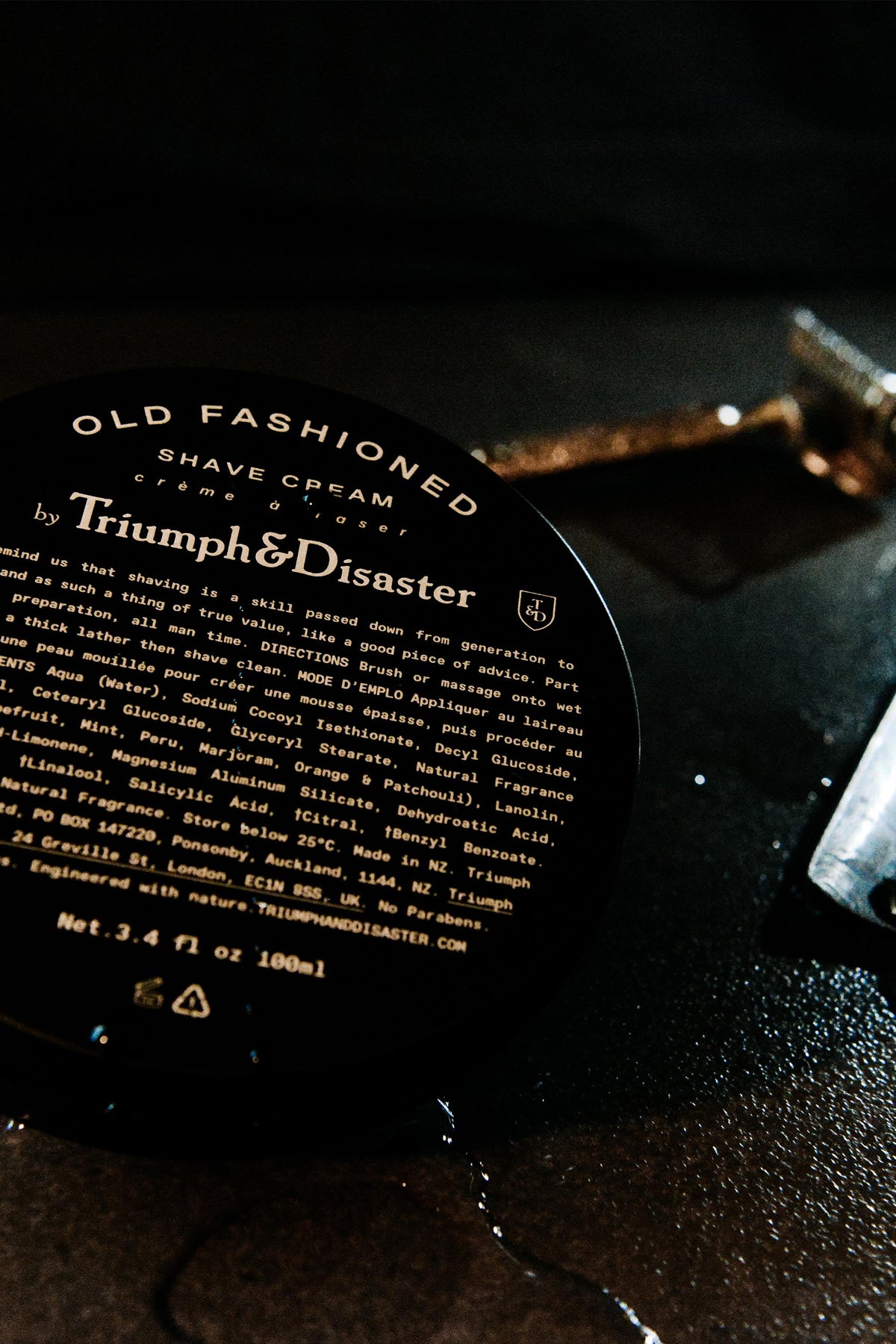 Triumph & Disaster Old Fashioned Shave Cream Jar and razor—classic tools for a traditional shave.