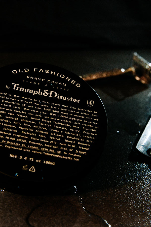 Triumph & Disaster Old Fashioned Shave Cream Jar and razor—classic tools for a traditional shave.