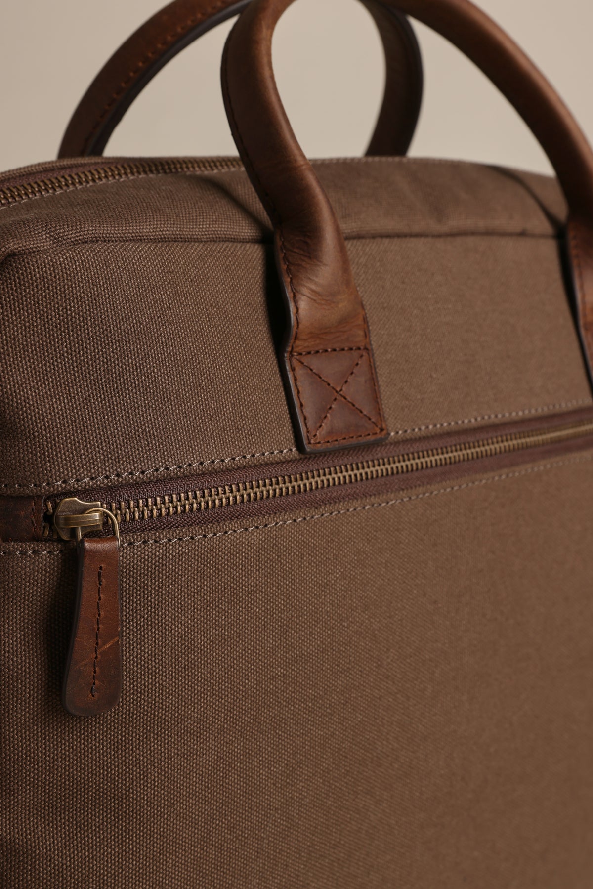 Barkers Redford Canvas Laptop Bag with leather handles, shown in close-up.