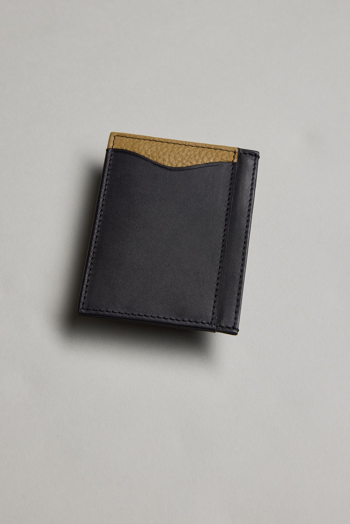 Barkers Taylor Leather Card Wallet in brown, slim design on a light gray surface.