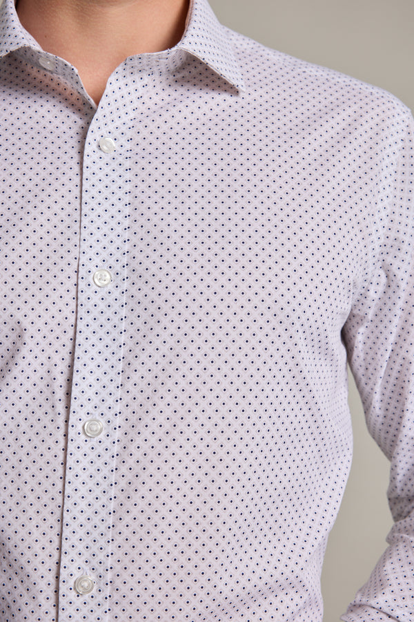 A person wears the Barkers Foster Print Business Shirt—a light-colored, wrinkle-free, tailored-fit shirt with a small dark dot pattern—buttoned up, showing only the upper torso and part of the neck.