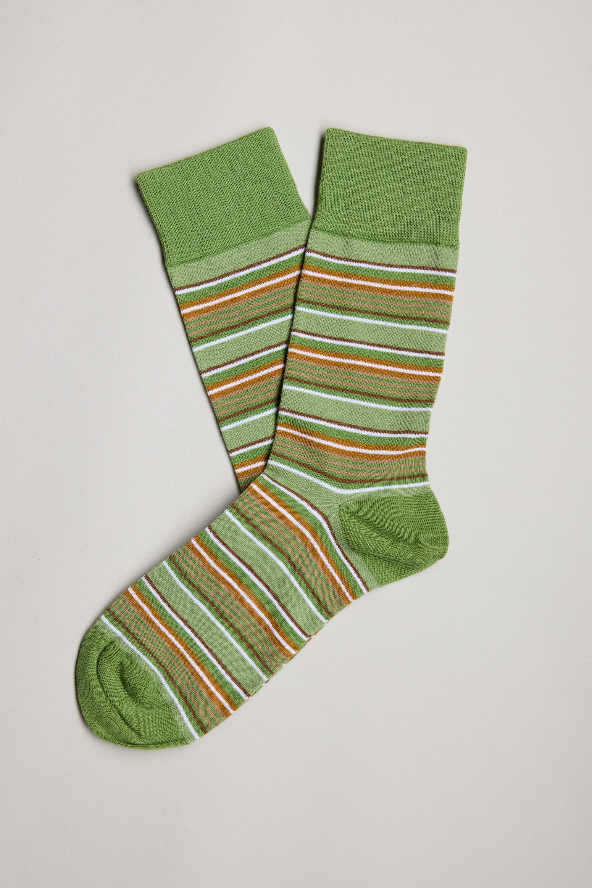 A pair of Barkers Ashley Stripe Socks in green with white, orange, and brown stripes—crafted from soft cotton for everyday comfort.
