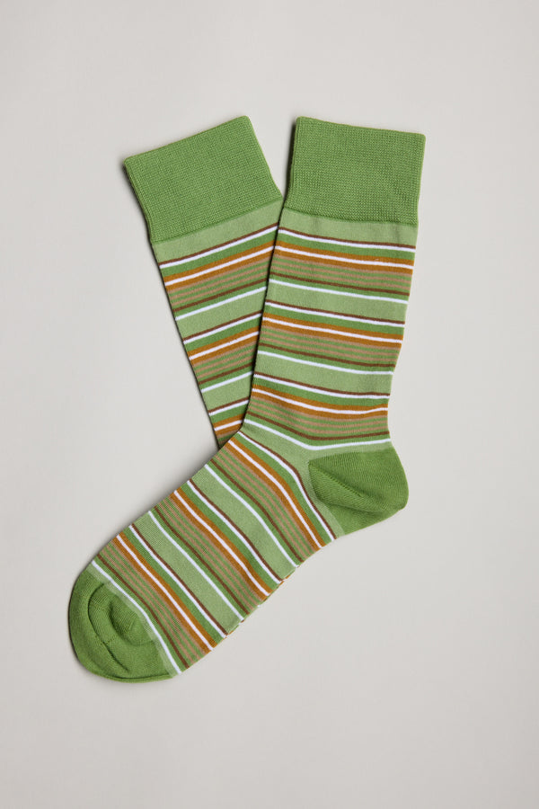 A pair of Barkers Ashley Stripe Socks in green with white, orange, and brown stripes—crafted from soft cotton for everyday comfort.