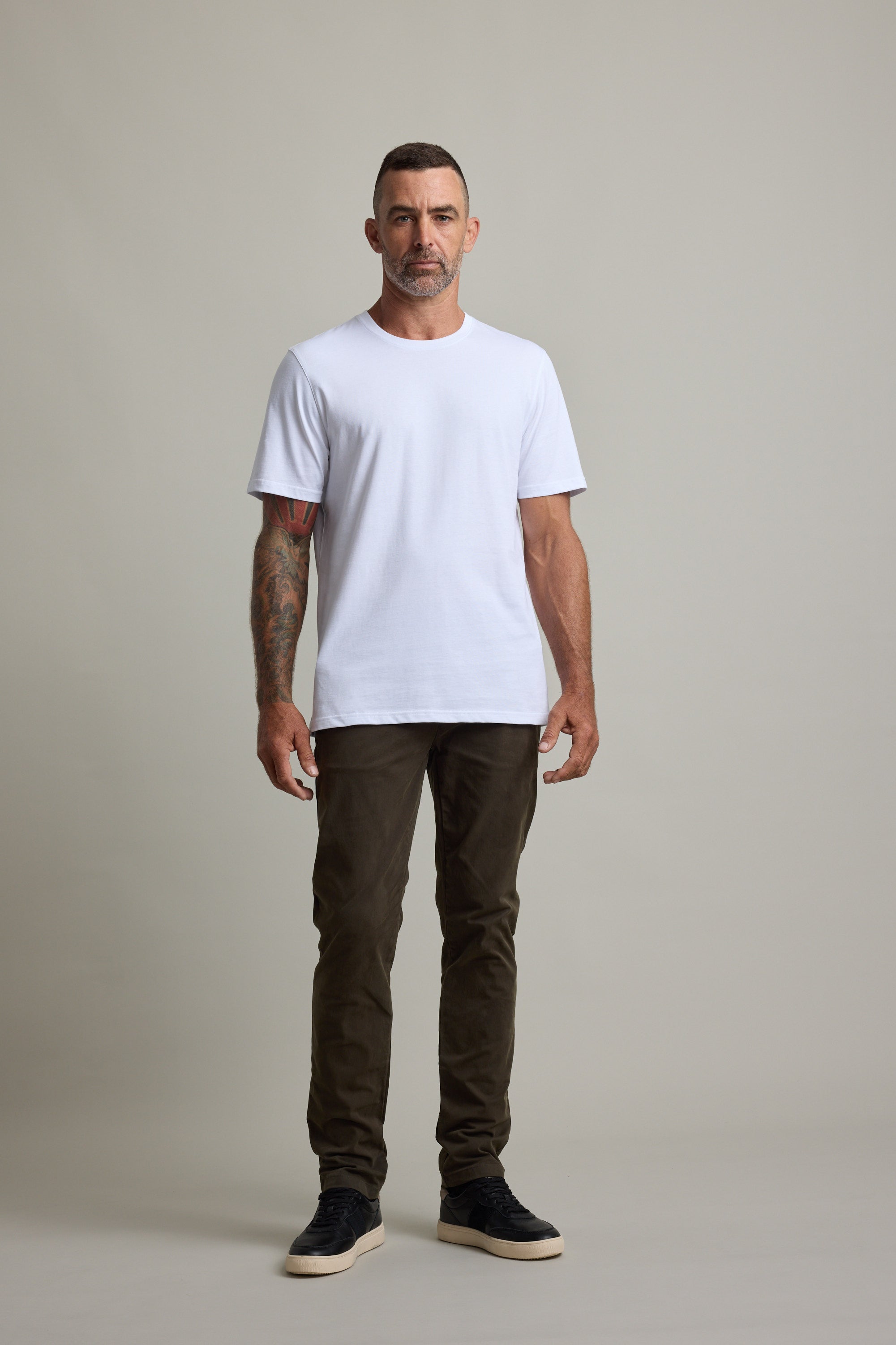 Man models Barkers Good Earth Cotton Essential Tee against a plain light background.