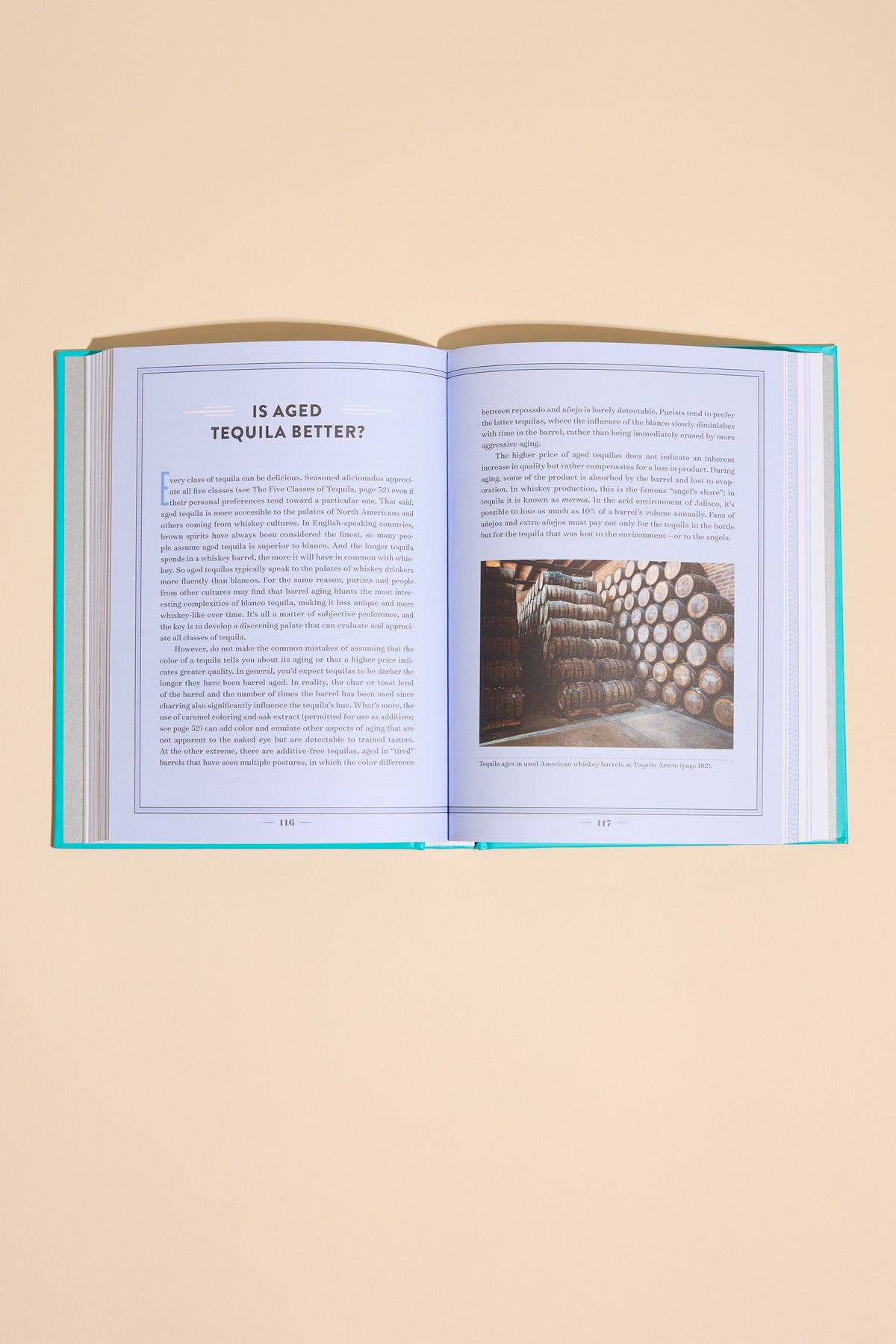 A Field Guide To Tequila by Other, open to a tequila guide and barrel photo.