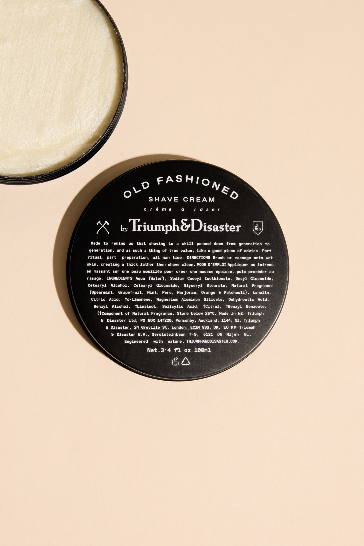 Triumph & Disaster Old Fashioned Shave Cream Jar in black tin, lid off, for men’s grooming.