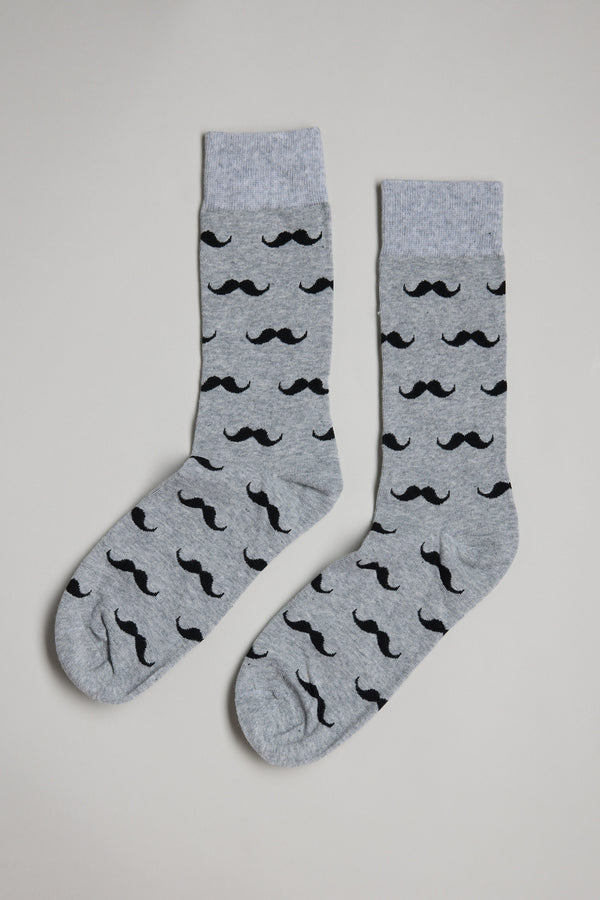 A pair of Barkers Moustache Socks in gray with black mustache patterns, laid flat on a light background—ideal for Secret Santa or Christmas gifts.