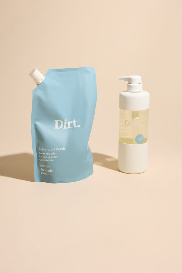 A light blue refill pouch and a white pump bottle of Other's Advanced Wash Starter Pack are displayed upright on a beige background. The pouch highlights odour removal benefits, making it an ideal laundry detergent starter set.